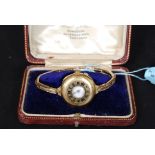 Ladies 18ct gold watch with rolled gold strap. Enscribed Phil and Jim 1926 with presentation box.