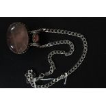 A large heavy chunky 925 white metal silver necklace, with large inset purple stone,