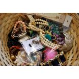 A collection of assorted costume jewellery to include watches, bracelets, brooches and other items.