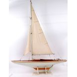 POND YACHT; A vintage model pond yacht, with large white linen sale,