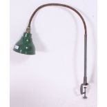 A vintage industrial machinists lamp with pendant shade finished in green with a Goose neck column