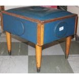 A vintage early 20th century blue vinyl and beech wood foot rest of unusual shape together with an