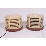 A pair of vintage 1950's Art Deco HMV heaters in the manner of Christian Bauman.