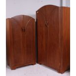 A pair of 1930's Art Deco oak wardrobes.