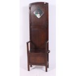 An Edwardian oak hallstand / coat rack settle having box seat to centre with hooks atop H182 W53