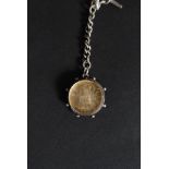 A silver hallmarked Albert chain having coin and enamel set pendant with hallmarked sides.