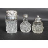 A collection of 3x hallmarked silver topped perfume bottles / condiment shakers.