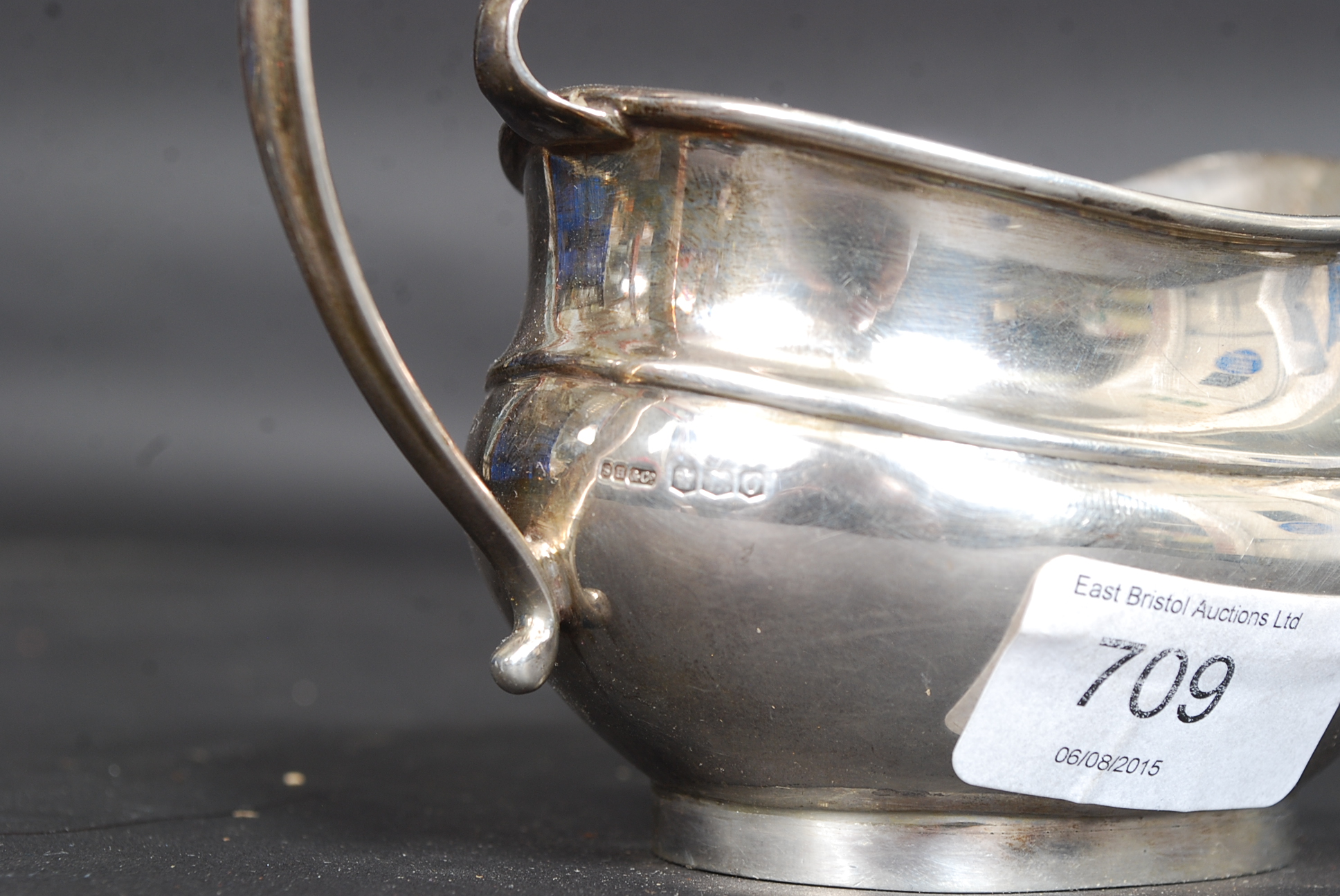 A hallmarked silver creamer jug with marks for Birmingham and a date letter O. - Image 2 of 2
