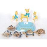 A mixed lot to include three vintage plastic Babycham fawn figures and a collection of Wade items.