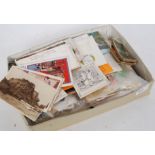 A collection of stamps / postcards etc some being loose together with album etc