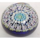 A Perthshire millefiori paperweight bearing P to the central cane complete with the sticker to