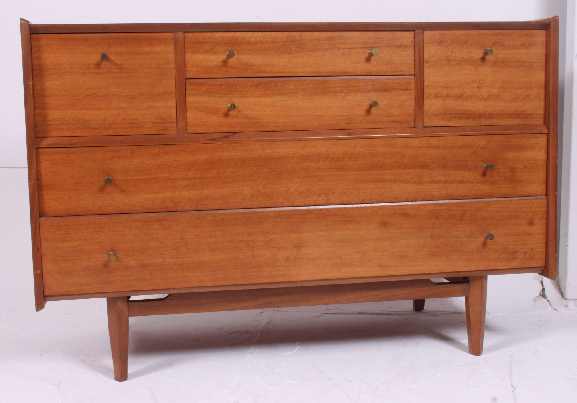 A good 1970's retro Danish influenced teak wood chest of drawers.