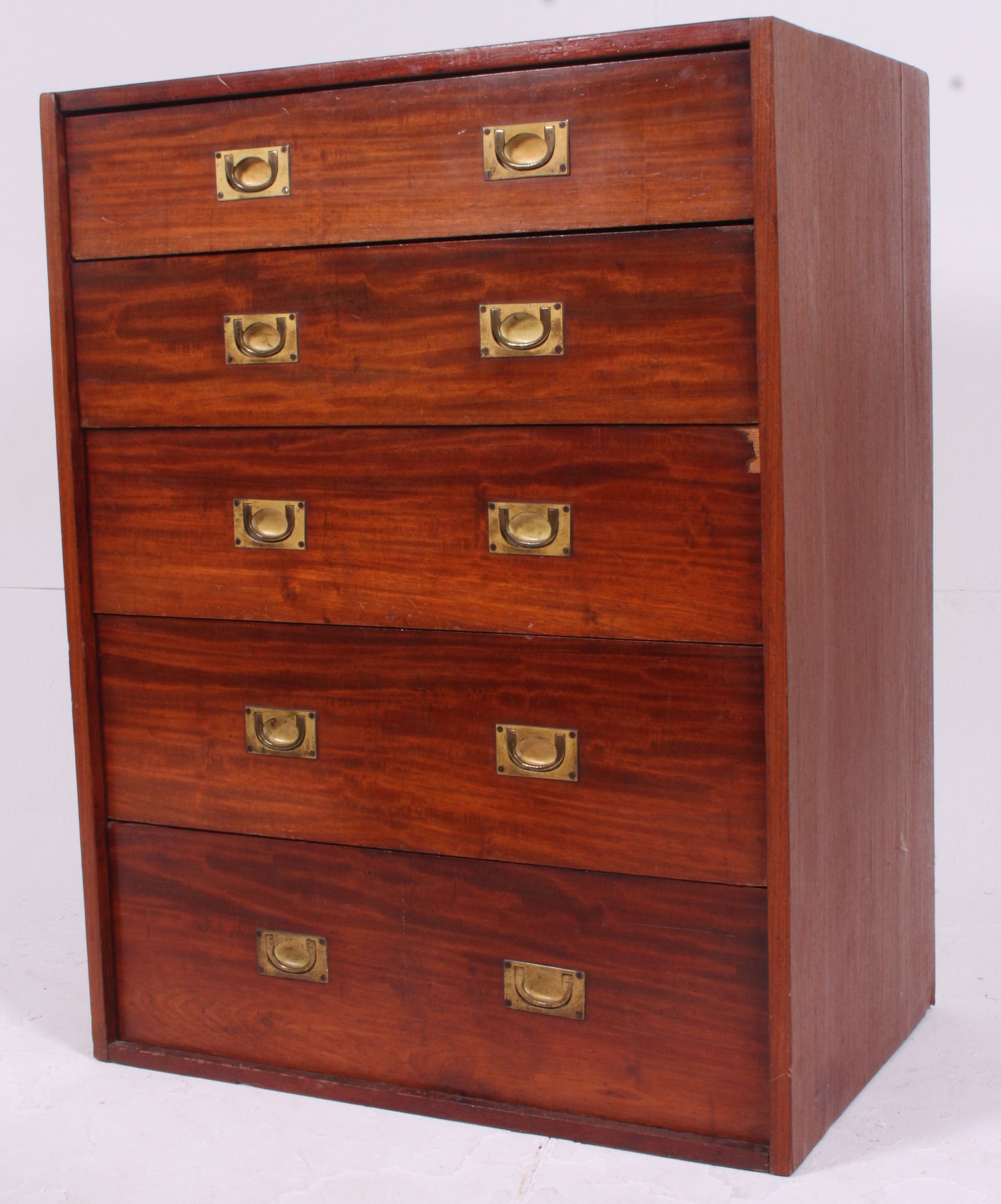 A good quality 1940's teak wood campaign style chest of drawers.