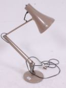 A vintage Herbert Terry anglepoise industrial desk lamp in beige.