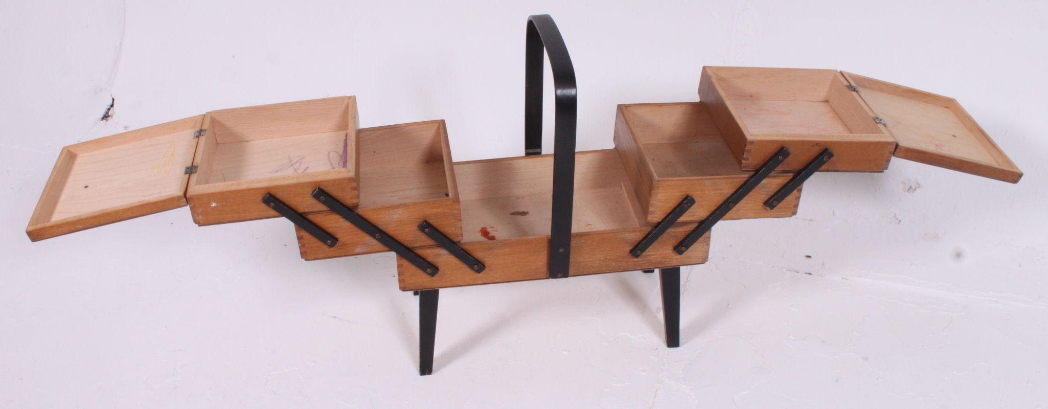 A 1950's beech and ebonised metamorphic sewing box having sectional extending body with handle to - Image 2 of 3