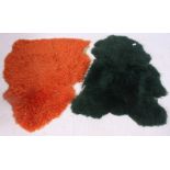 A pair of retro dyed green and orange sheepskin rugs H105 W90cm