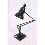 An early Herbert Terry & Sons anglepoise lamp with cast iron square step base with pendant shade