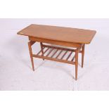An unusual 1960's Formwood Furniture Co Special Needs adapted faux wood formica coffee table having