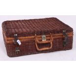 A vintage wooden  picnic hamper complete with plates cups,