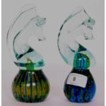 A pair of MDina studio glass paperweights in the form of sea horses,