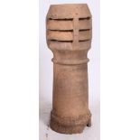 A 20th century vintage chimney pot / rhubarb forcer of cylindrical form with vented top