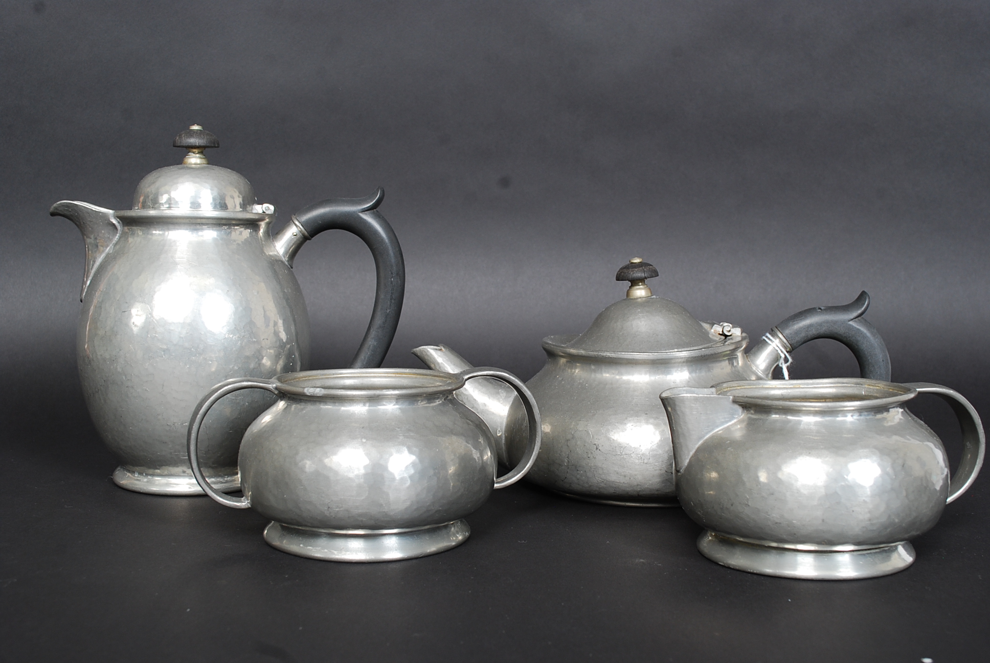 A Liberty ' Tudric ' 4 piece coffee / tea service to include coffee pot, teapot.