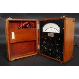 A vintage mahogany cased high quality multimeter instrument, Ranges; Volts, Amps, Watts, Ohms,