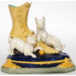 A Victorian 19th Century Brown Westhead Moore & Co majolica terrier and boot spill vase,