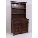 A Jaycee / Old Charm oak dresser in the Jacobean revival style.