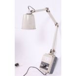 An early 20th century industrial wall mounted adjustable Memlite  anglepoise light,