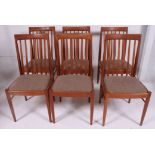 An excellent set of 6 1970's retro teak wood feather railed back Danish style chairs.
