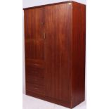 A retro 1960's Austinsuite teak wood compactum wardrobe armoire.
