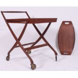A retro teak wood collapsible buffet trolley along with a similar tray both stamped Denmark H75 W63