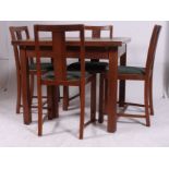 A 1930's Art Deco oak draw leaf refectory dining table together with a set of 4 matching oak dining