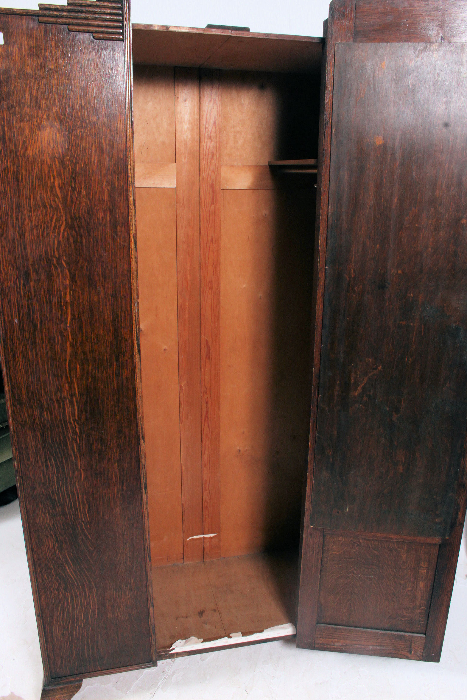A 1930's Art Deco oak single wardrobe having shaped top with central mirror door having hanging - Image 2 of 3