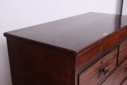 A Victorian mahogany chest of drawers raised on bracket feet with 2 short over 3 deep drawers each