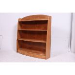 A good quality 20th century beech wood bow front open window bookcase cabinet having central