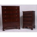 A Regency style mahogany chest of drawers being raised on bracket feet with upright chest having