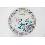 A Chinese large wall charger  of Famille Rose style decorated with butterflies and peonies W22cm