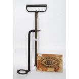 A floor standing Stirrup pump and a vint