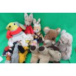 A group of 12 vintage teddy bears and pu