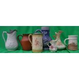 A good group of well styled jugs to incl