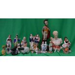 A group of porcelain figurines to includ