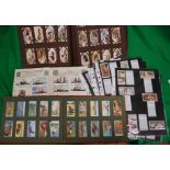 A collection of vintage cigarette cards