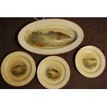 A group of 4 Hurrley ware fish plates ,