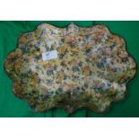 An early 20th Century paper mache plate