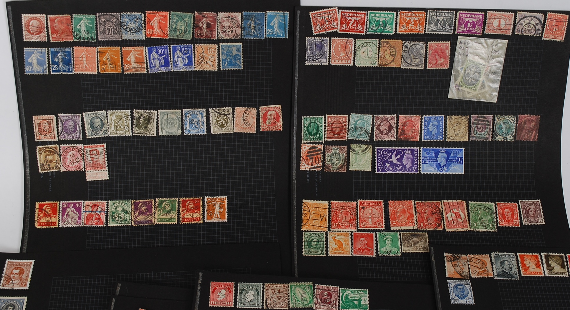 A collection of stamps on black boards to include New Zealand, India, American, Canada, German, - Image 4 of 4