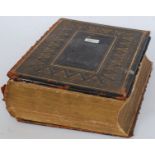 A gilt tooled early 20th century leather bound Imperial Bible printed by Blackie & Son,
