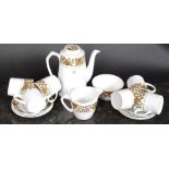 A retro six person's coffee service consisting of six cups, six saucers, pot,