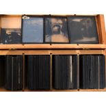 A large collection ( 70 + ) original early 20th century magic lantern glass photographic slides to